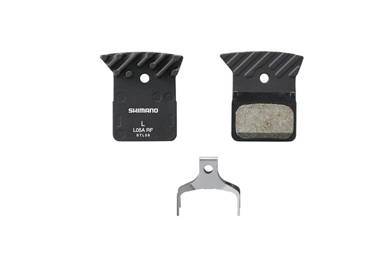 PLAQUETTES DE FREINS SHIMANO ( PAIRE ) RESINE L05A  AVEC RESSORT ET VIS