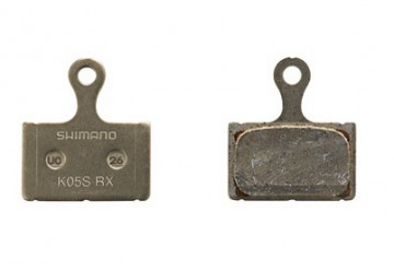 PLAQUETTES SHIMANO  en résine et ressort K05S-RX (paire)